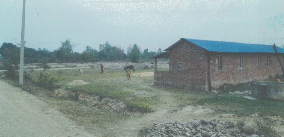 सिराहा जिल्ला नैनपुर गा.वि.स. वडा नं. ९, (हाल धनगढीमाई नगरपालिका वडा नं. ११) नक्सा सीट नं. ९ख स्थित कित्ता नं. १ को जग्गा क्षेत्रफल २–८–१४–० (विघा–कठ्ठा–धुर–कन्वा) (१६,४९१.७४ व. मी.) जग्गा 7